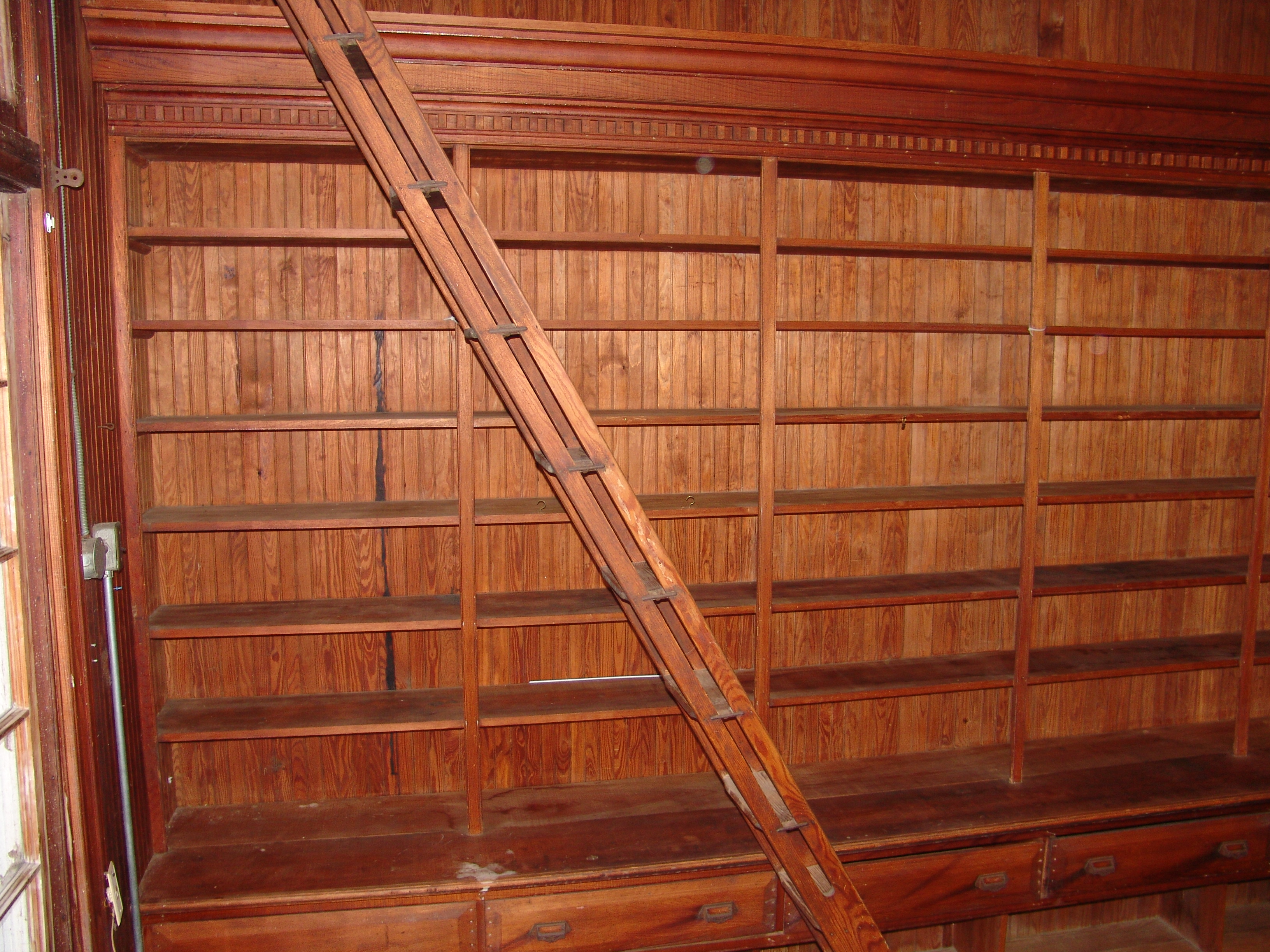 Original rolling ladders and shelving.